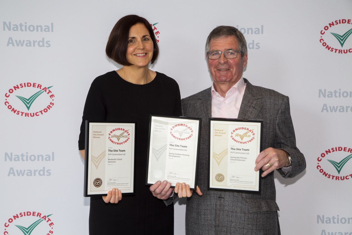 Phil Bradley and Joanne James collecting Considerate Constructors awards